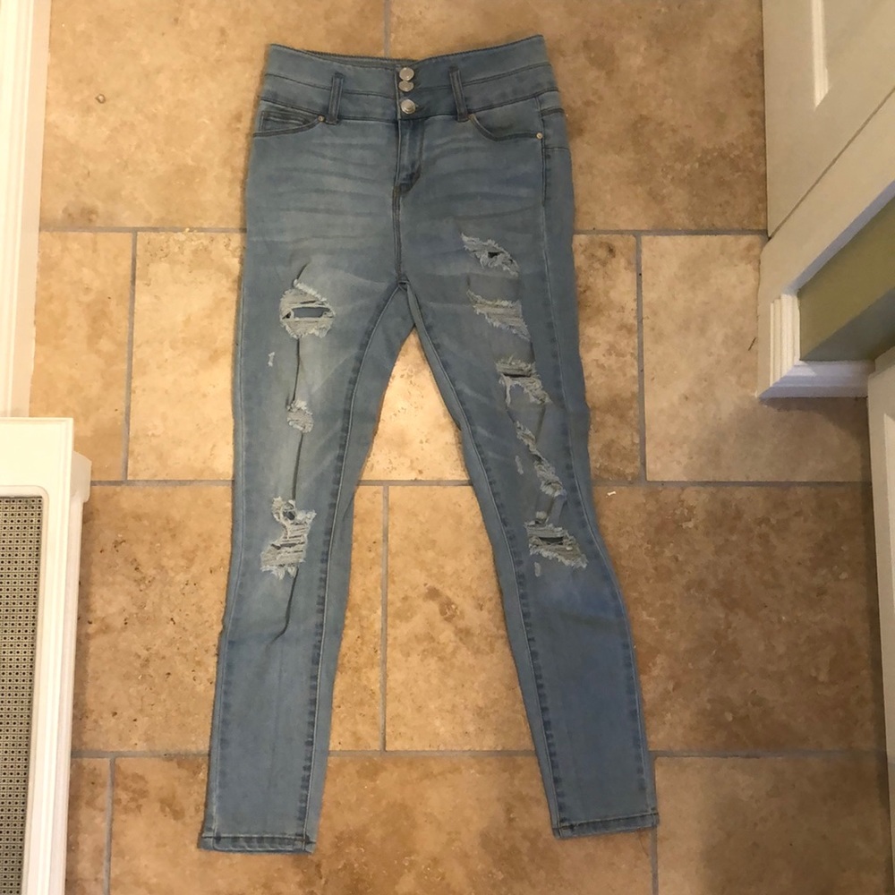 High waisted light wash, distressed skinny jeans